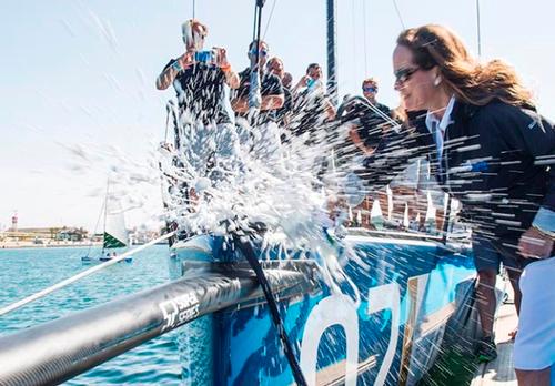 Princess Zahra Aga Khan baptises her new yacht Azzurra by breaking a bottle of champagne Dom Perignon on Azzurra’s bow (Credit: 52 Super Series 2015, Martinez Studio/52 Super Series)